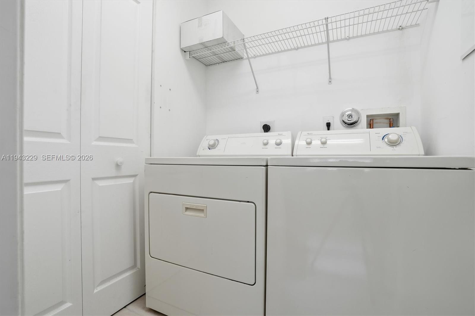 16367 Southwest 48th Street Miramar, FL 33027 - Photo 21 of 41 a utility room with dryer and washer