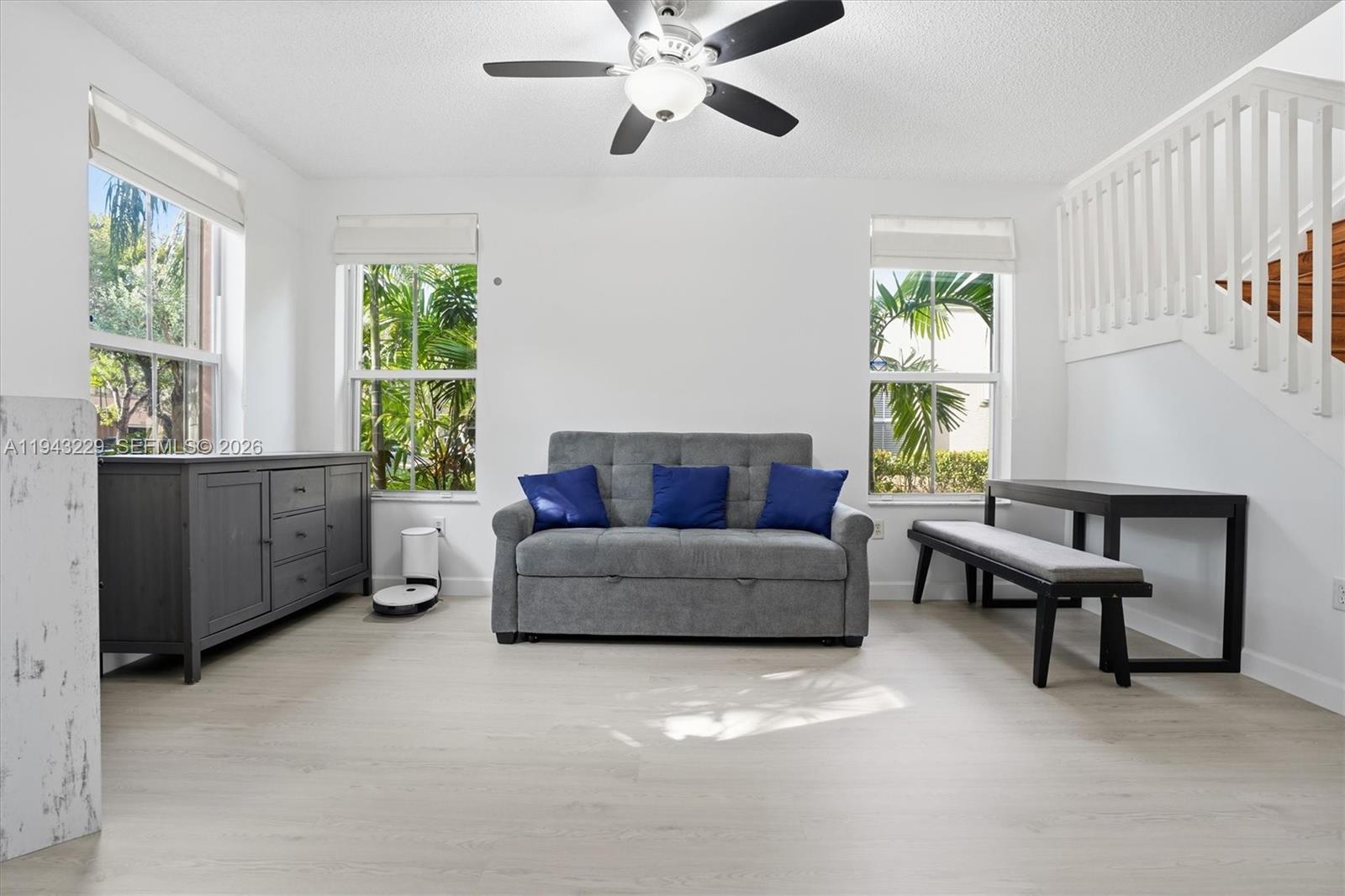 16367 Southwest 48th Street Miramar, FL 33027 - Photo 3 of 41 a living room with furniture and a window