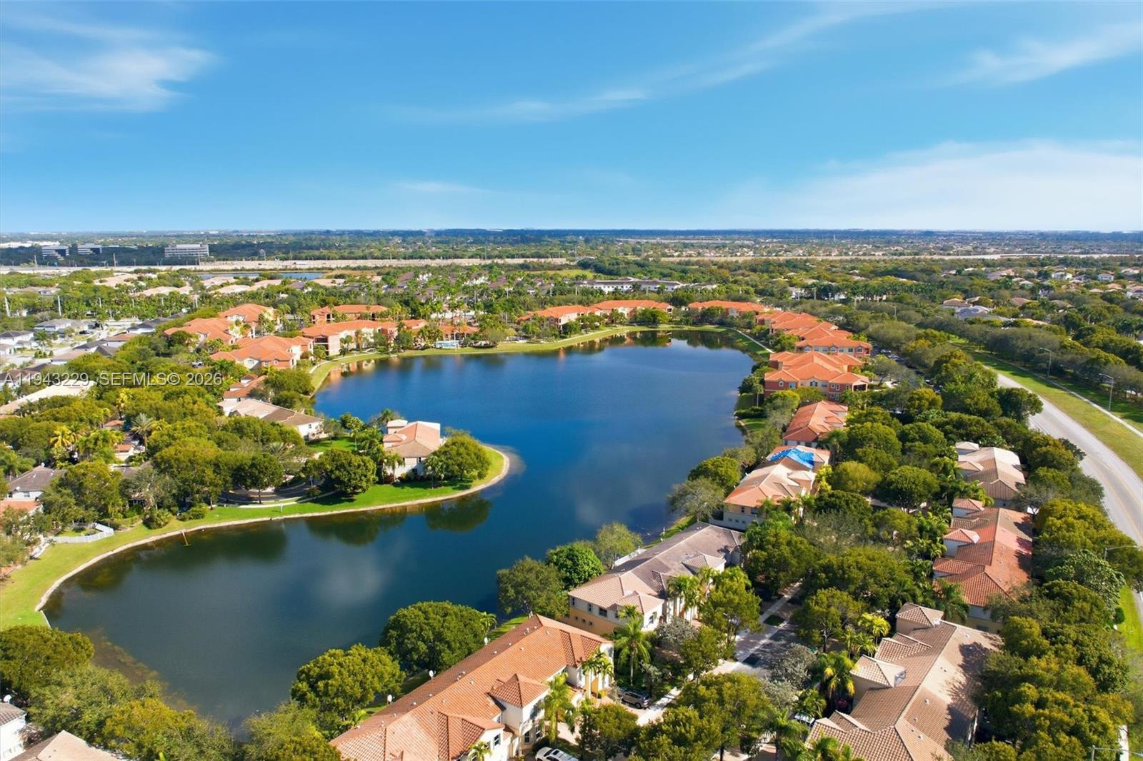 16367 Southwest 48th Street Miramar, FL 33027 - Photo 31 of 41 an aerial view of a houses with a lake view