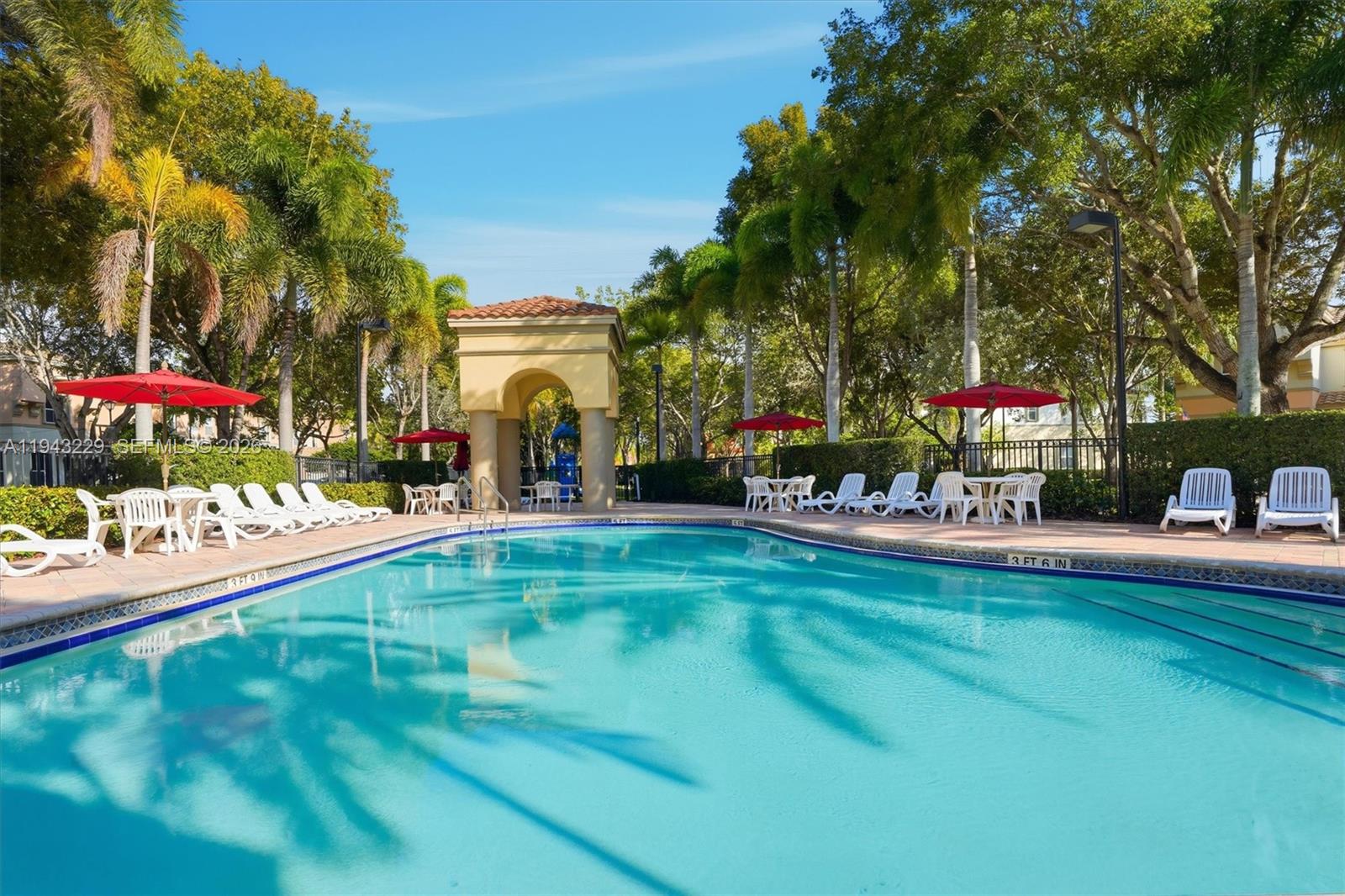 16367 Southwest 48th Street Miramar, FL 33027 - Photo 38 of 41 a childrens park with lots of swings and slides