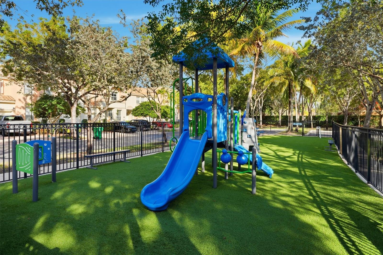 16367 Southwest 48th Street Miramar, FL 33027 - Photo 41 of 41 a view of a park with swings