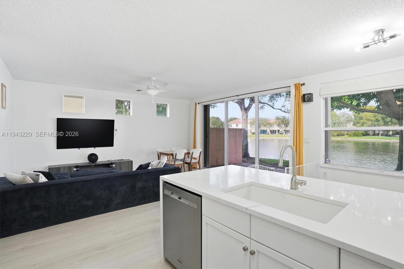 16367 Southwest 48th Street Miramar, FL 33027 - Photo 10 of 41 a spacious bathroom with a sink and a flat screen tv