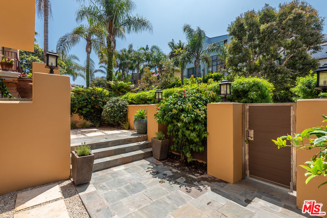 117 Ketch Mall Marina del Rey, CA 90292 - Photo 32 of 43 a view of a entryway with flower plants