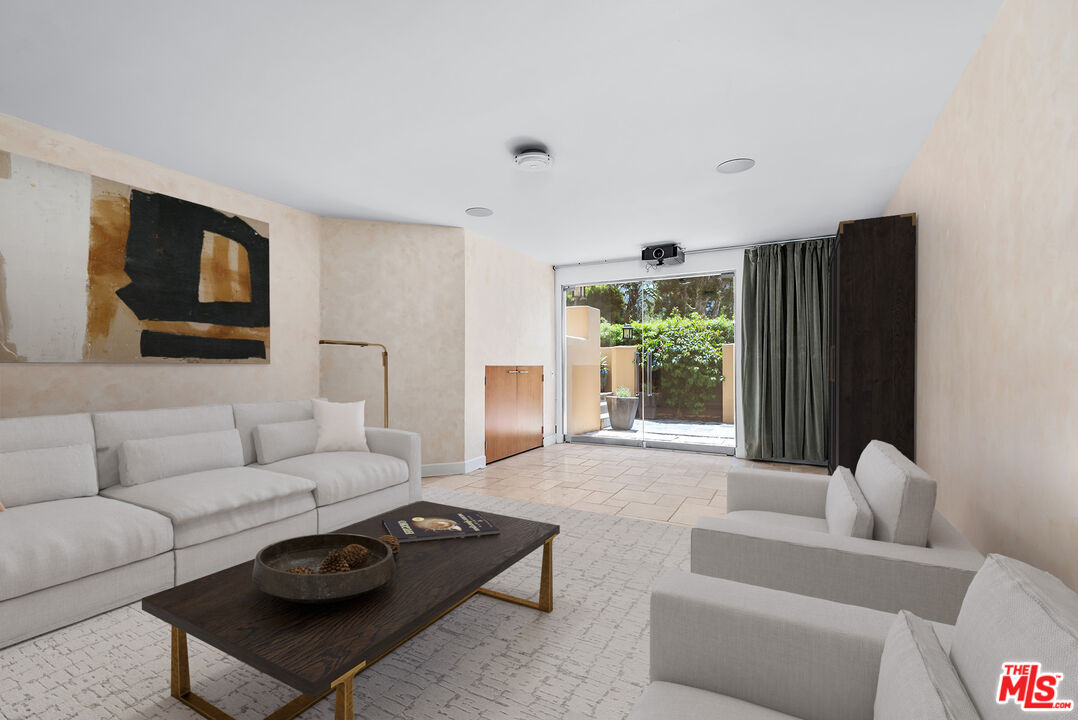 117 Ketch Mall Marina del Rey, CA 90292 - Photo 34 of 43 a living room with furniture and a flat screen tv