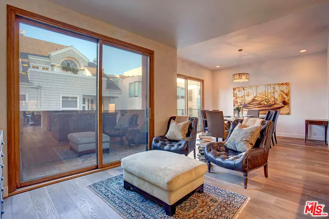 a living room with furniture and a gate