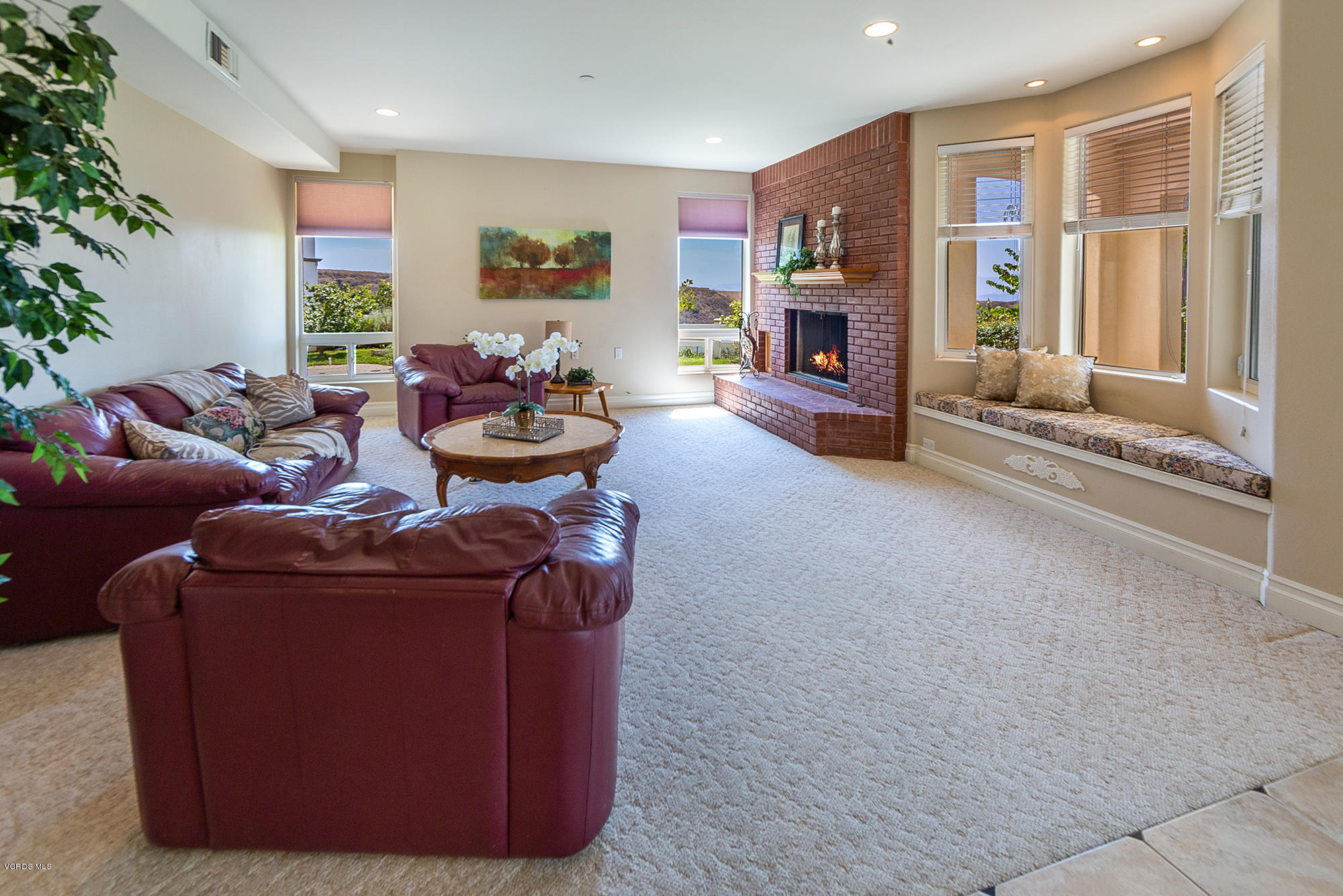 10089 Stockton Road Moorpark, CA 93021 - Photo 11 of 39 a living room with furniture and a fireplace