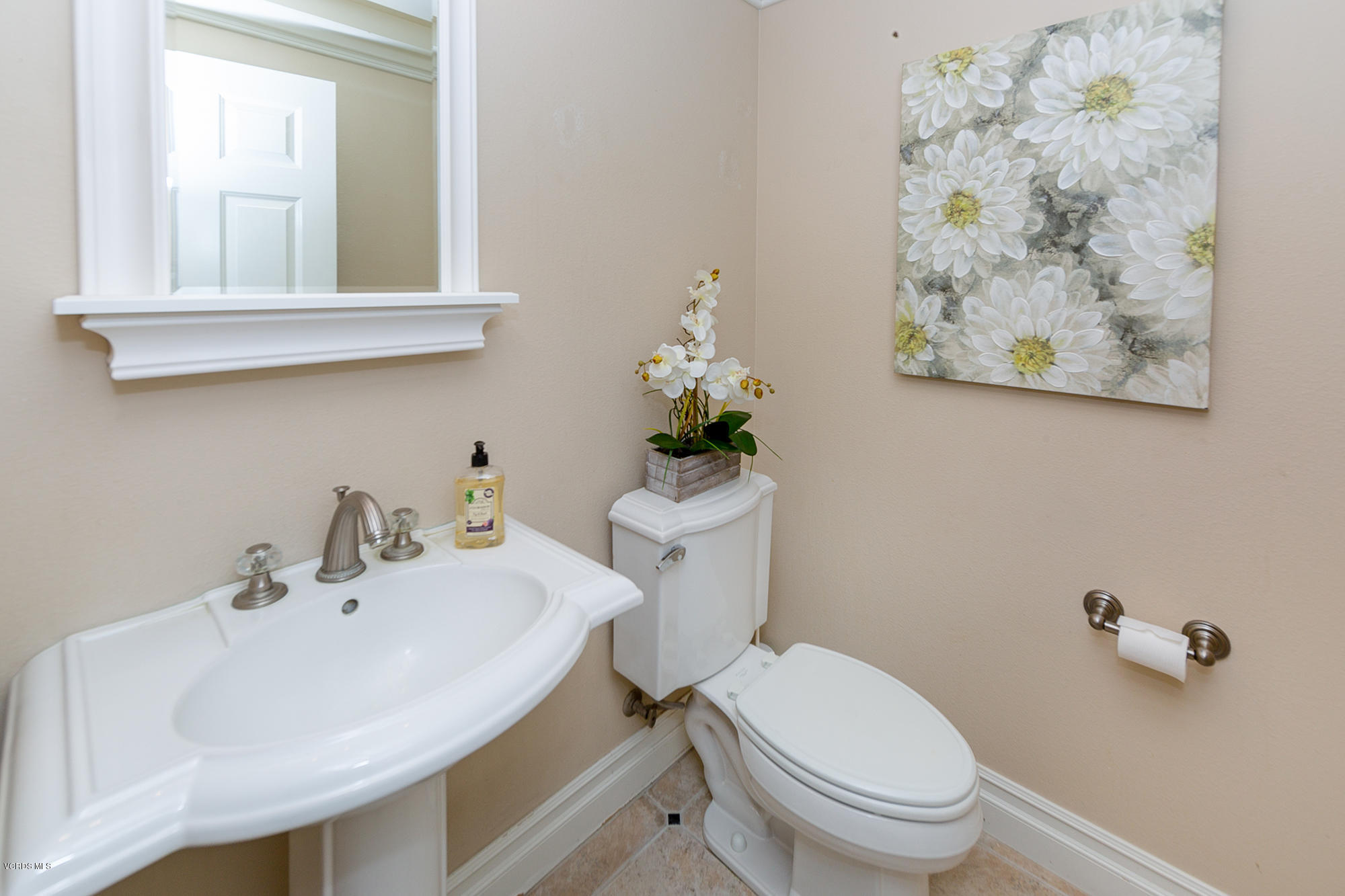10089 Stockton Road Moorpark, CA 93021 - Photo 38 of 39 a bathroom with a sink mirror and toilet