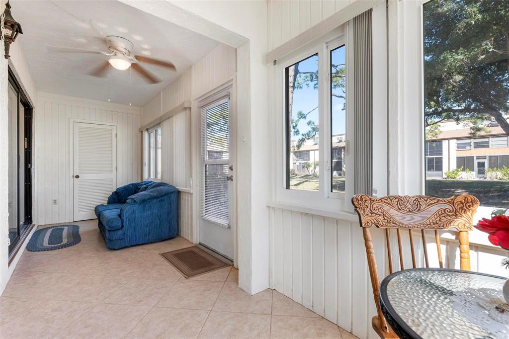 25 Quails Run Boulevard, Unit 6 Englewood, FL 34223 - Photo 28 of 31 a living room with furniture and a window