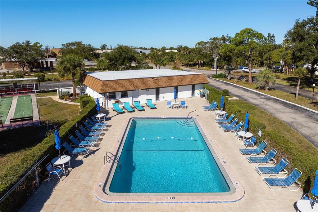 25 Quails Run Boulevard, Unit 6 Englewood, FL 34223 - Photo 30 of 31 a view of a swimming pool with a patio