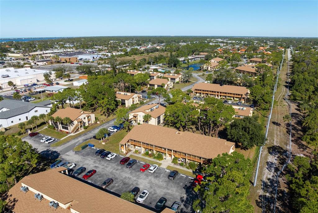 25 Quails Run Boulevard, Unit 6 Englewood, FL 34223 - Photo 7 of 31 an aerial view of residential houses with outdoor space