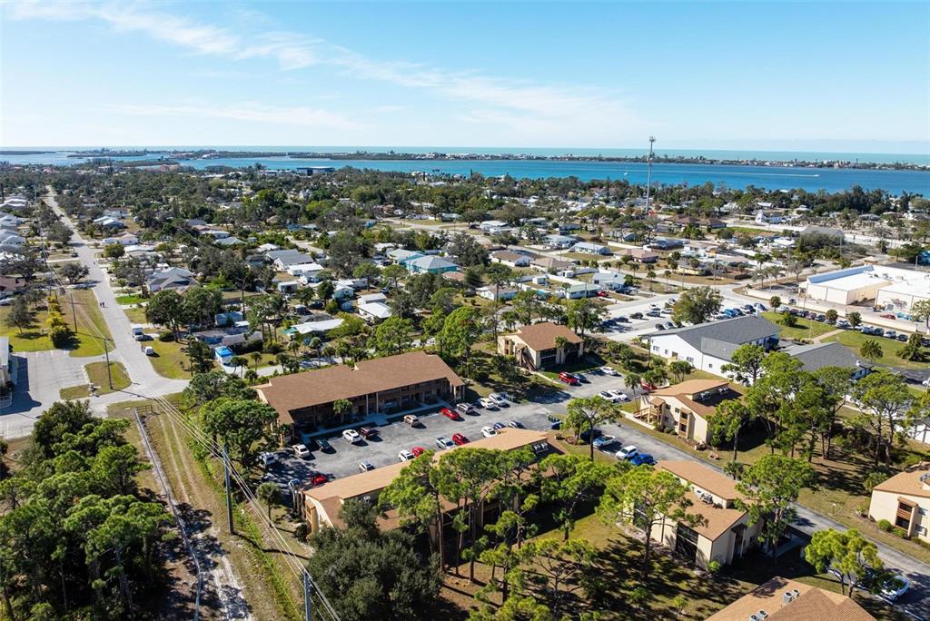 25 Quails Run Boulevard, Unit 6 Englewood, FL 34223 - Photo 8 of 31 an aerial view of multiple house