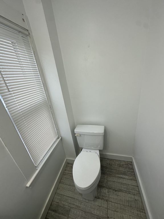 30 Clement Avenue, Unit 2 Peabody, MA 01960 - Photo 13 of 35 a bathroom with a toilet and a sink