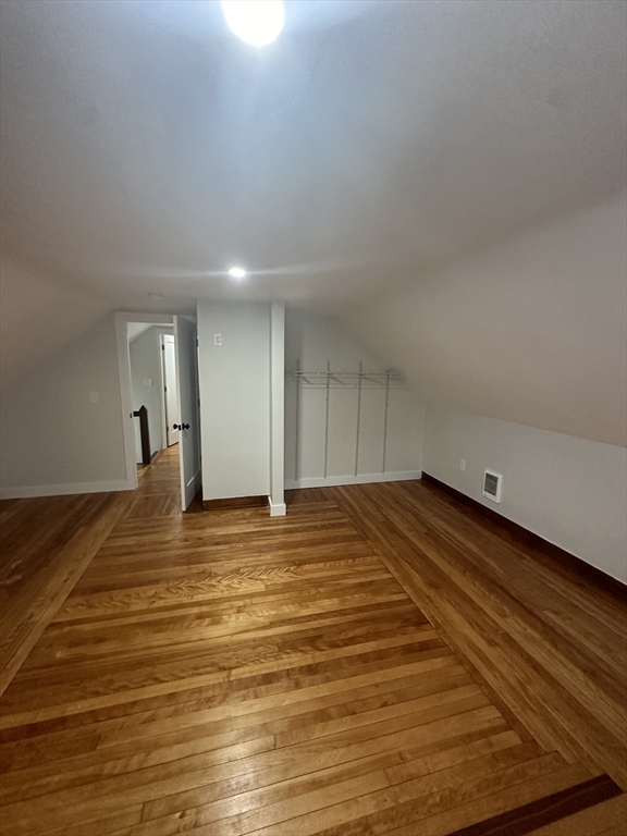30 Clement Avenue, Unit 2 Peabody, MA 01960 - Photo 20 of 35 a view of empty room with wooden floor