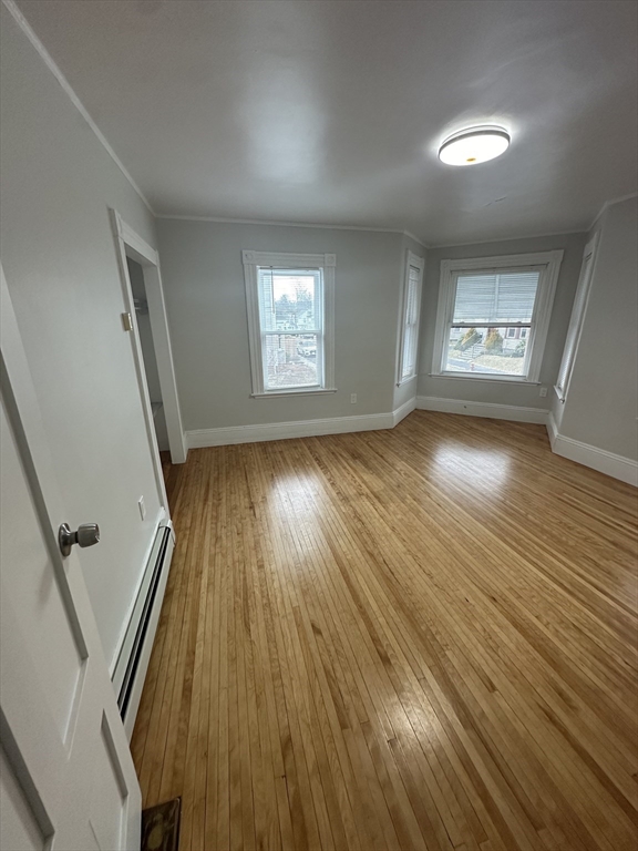 30 Clement Avenue, Unit 2 Peabody, MA 01960 - Photo 27 of 35 wooden floor in an empty room with a window