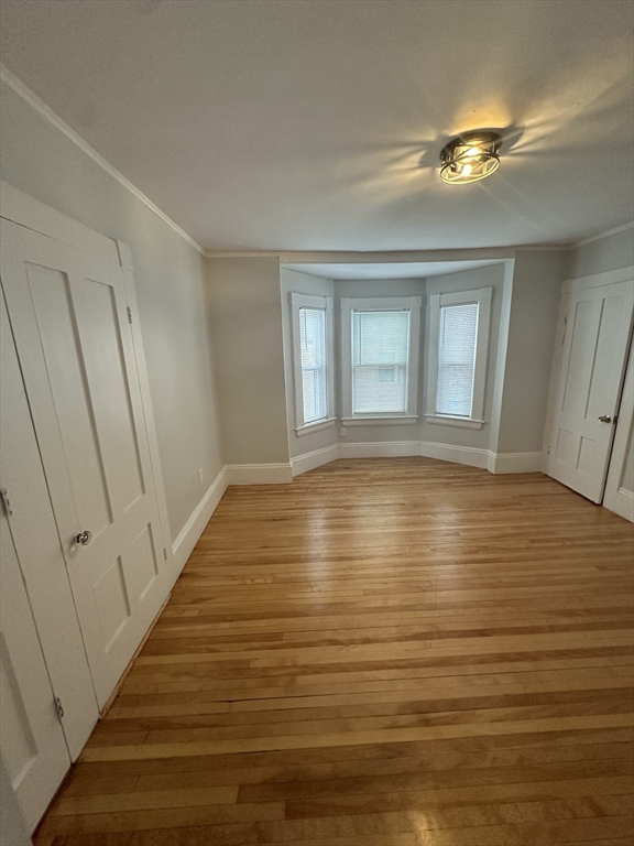 30 Clement Avenue, Unit 2 Peabody, MA 01960 - Photo 30 of 35 a view of empty room with wooden floor