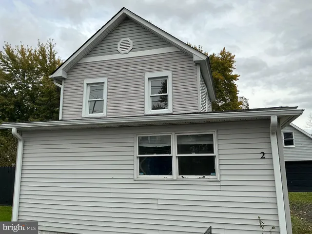 a kitchen with a stove and a refrigerator