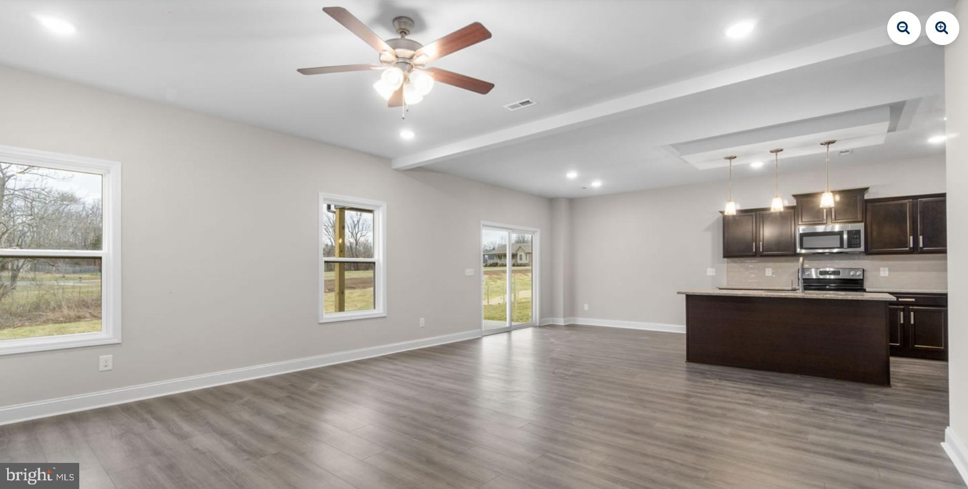 9911 Ridge Street Lanham, MD 20706 - Photo 4 of 10 a view of kitchen with stove and wooden cabinets
