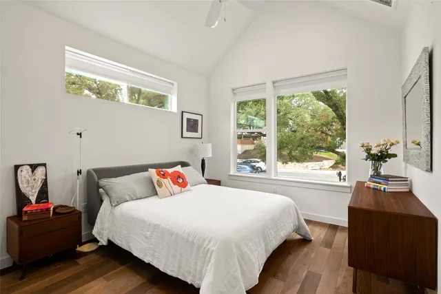a kitchen with a sink a stove and cabinets