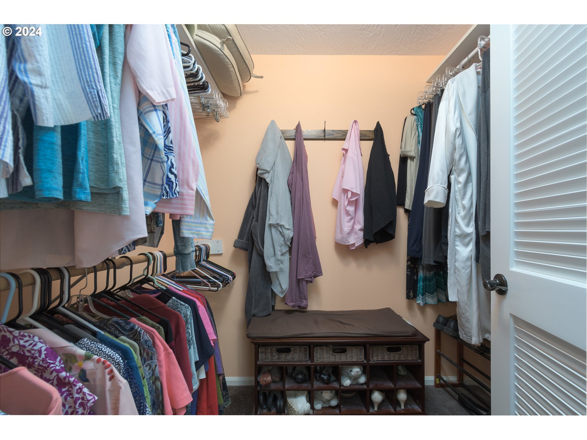 2969 Brett Loop Eugene, OR 97404 - Photo 19 of 33 a view of walk in closet with clothes and shoes