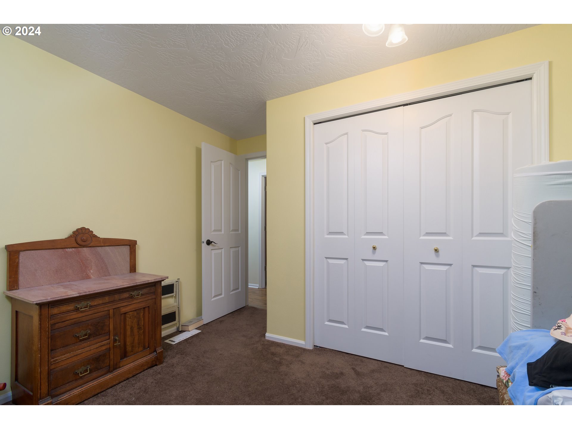 2969 Brett Loop Eugene, OR 97404 - Photo 23 of 33 a kitchen with a refrigerator and a sink