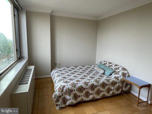 2800 Wisconsin Avenue Northwest, Unit 601 Washington, DC 20007 - Photo 10 of 28 a bedroom with a bed and a window