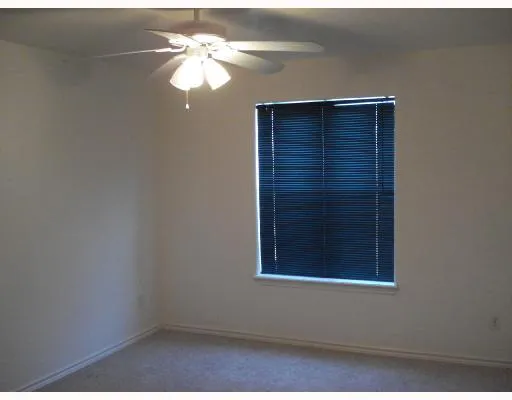 a view of a small space with a fan