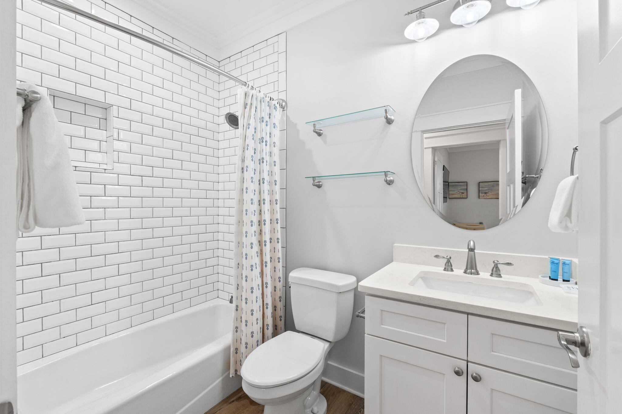 116 Riviera Drive Panama City Beach, FL 32413 - Photo 18 of 66 a bathroom with a sink toilet and shower