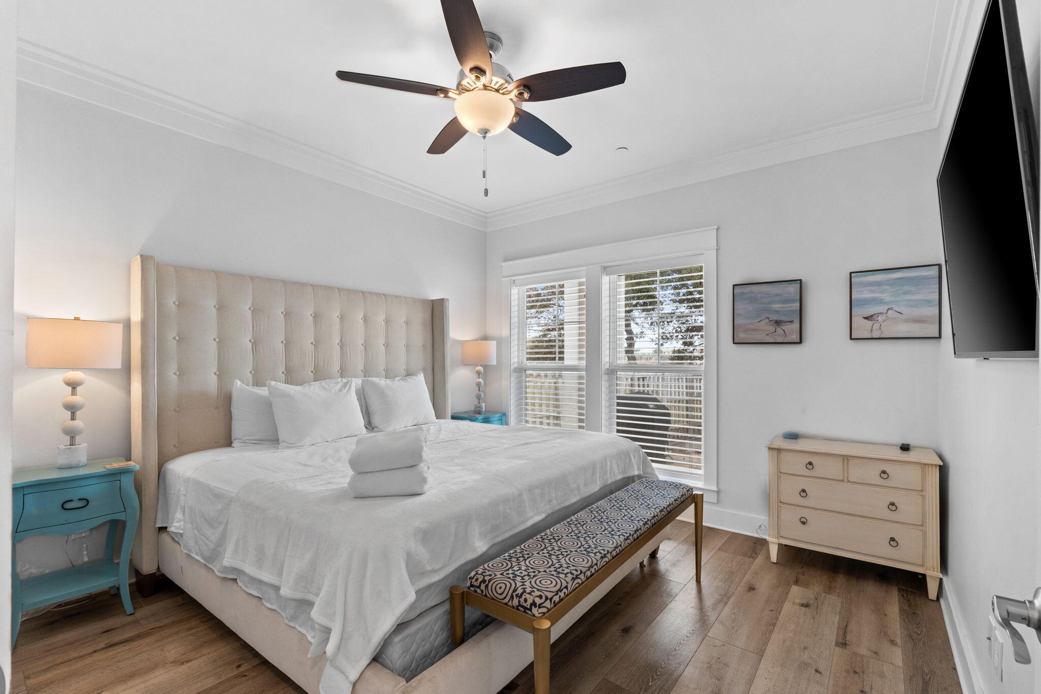 116 Riviera Drive Panama City Beach, FL 32413 - Photo 20 of 66 a bedroom with a bed a large window and flat screen tv