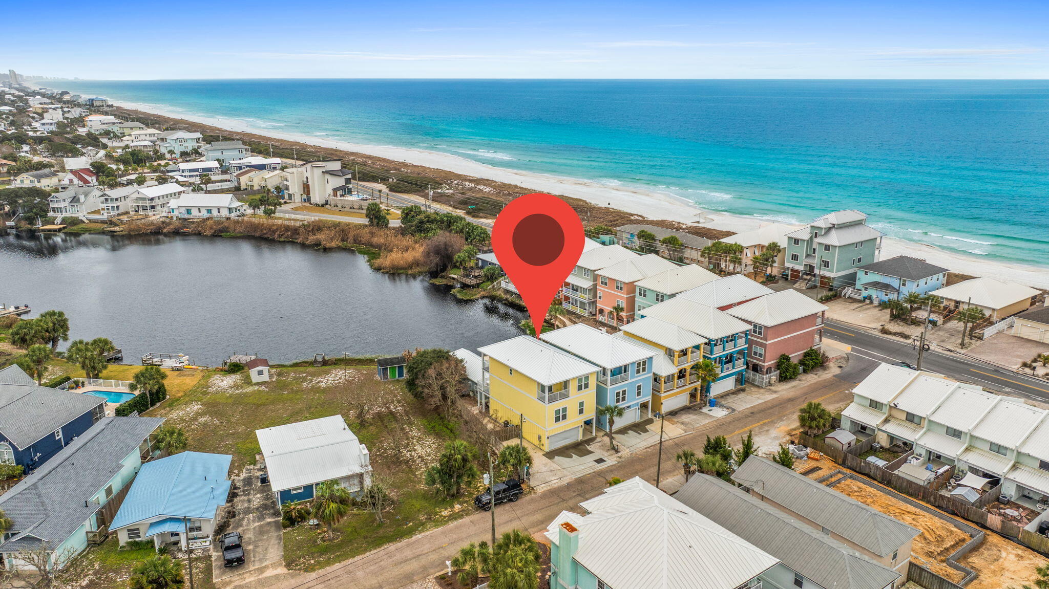 116 Riviera Drive Panama City Beach, FL 32413 - Photo 2 of 66 an aerial view of a house with a ocean view