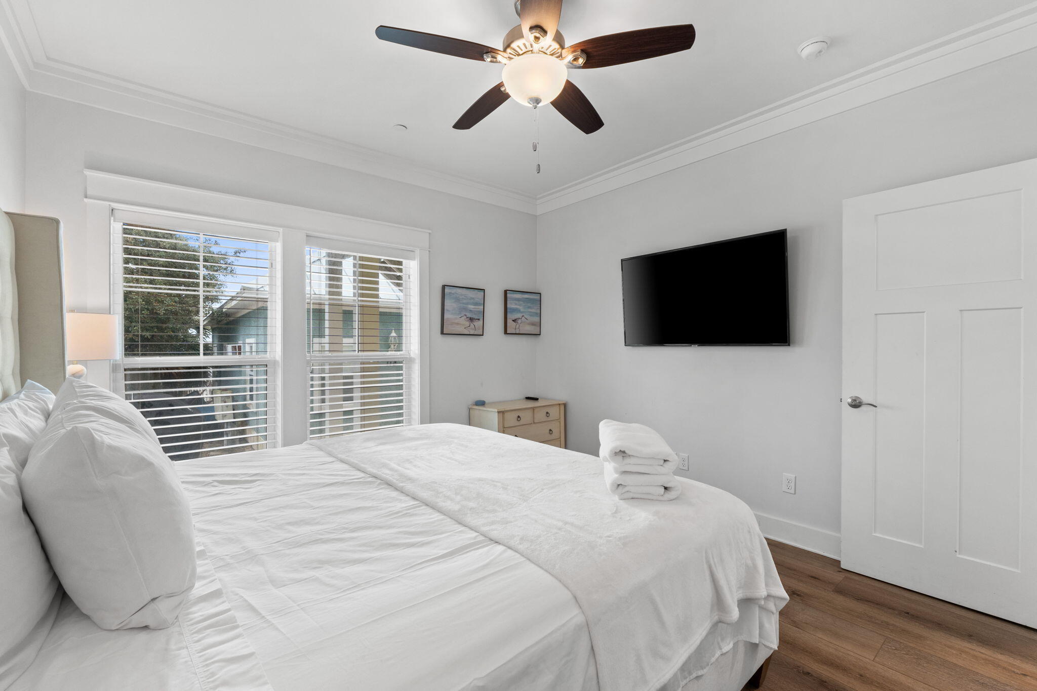 116 Riviera Drive Panama City Beach, FL 32413 - Photo 21 of 66 a bedroom with a bed tv and window