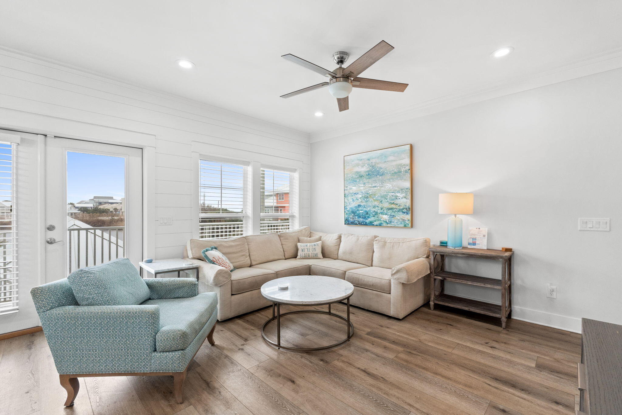 116 Riviera Drive Panama City Beach, FL 32413 - Photo 25 of 66 a living room with furniture and a large window