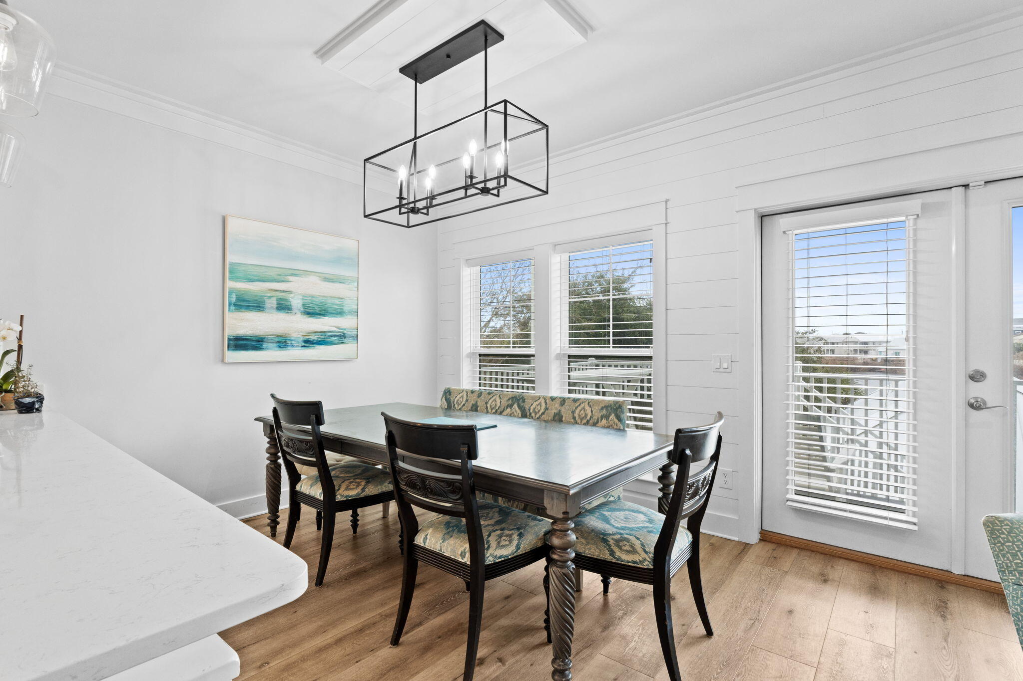 116 Riviera Drive Panama City Beach, FL 32413 - Photo 28 of 66 a view of a dining room with furniture window and wooden floor