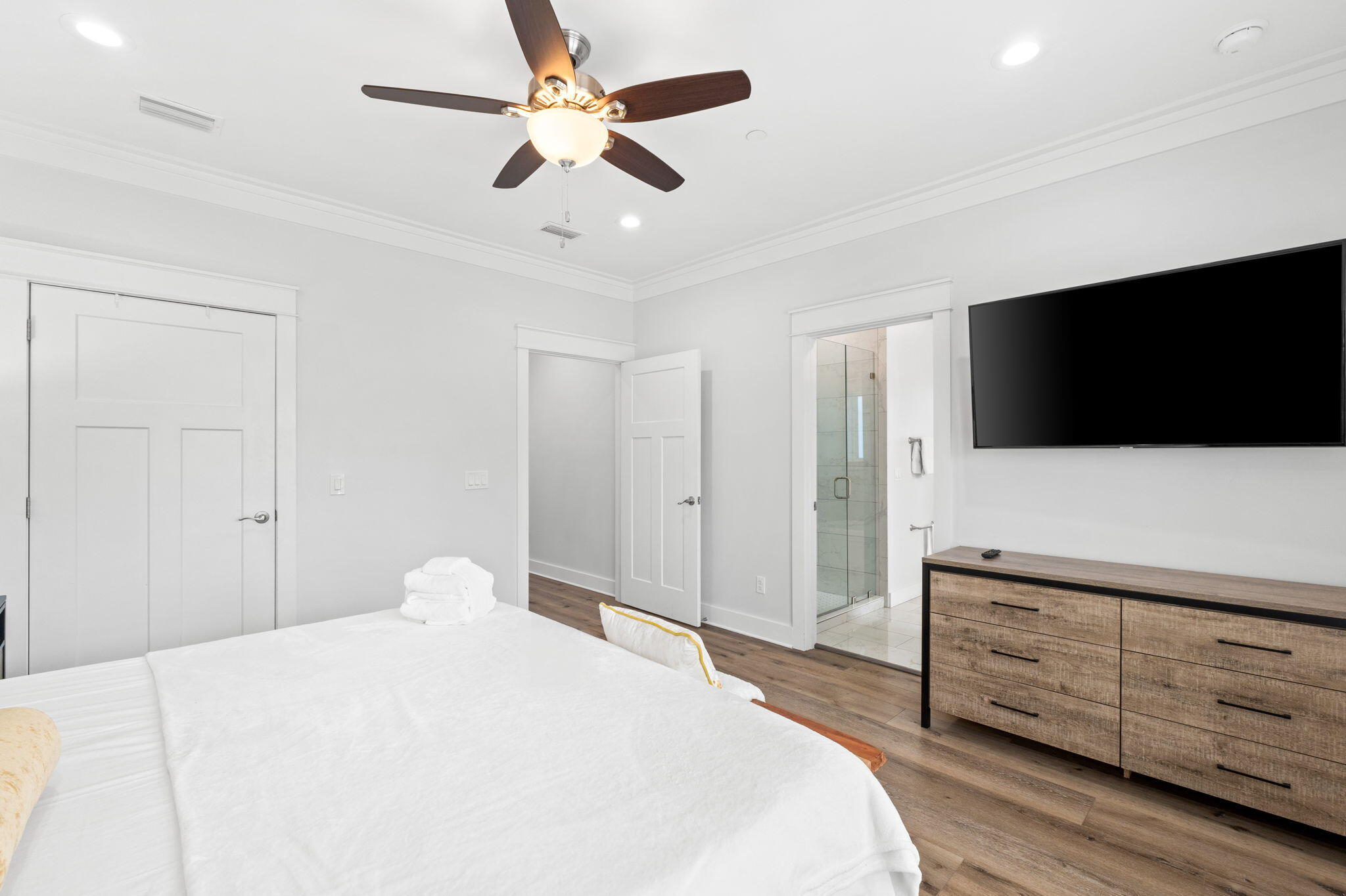 116 Riviera Drive Panama City Beach, FL 32413 - Photo 33 of 66 a bedroom with a bed and a flat screen tv