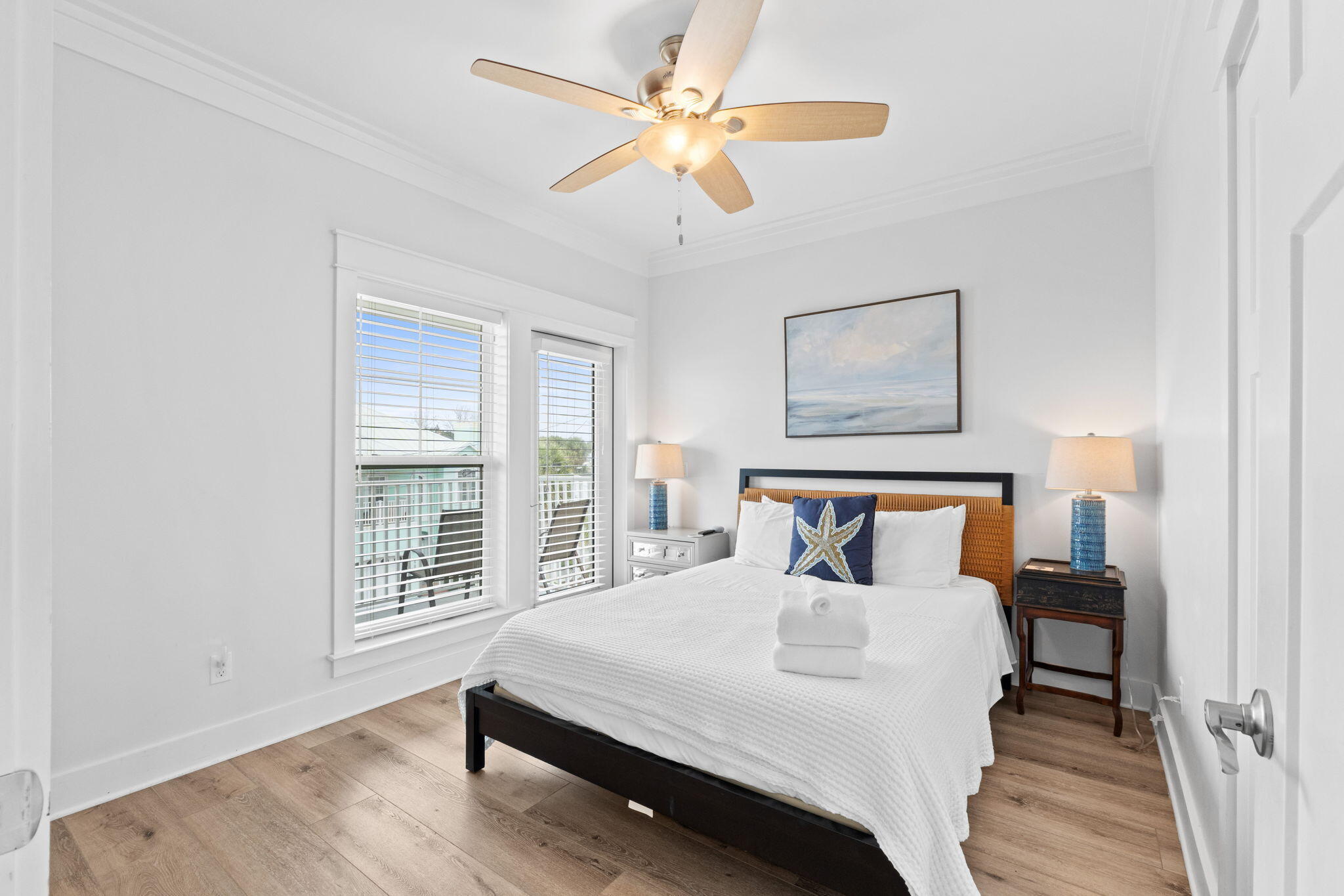 116 Riviera Drive Panama City Beach, FL 32413 - Photo 60 of 66 a bedroom with a bed and a window