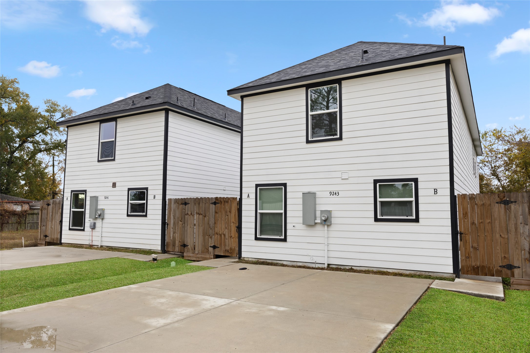 9243 Seeker Street Houston, TX 77028 - Photo 1 of 22 a front view of a house with a yard and garage