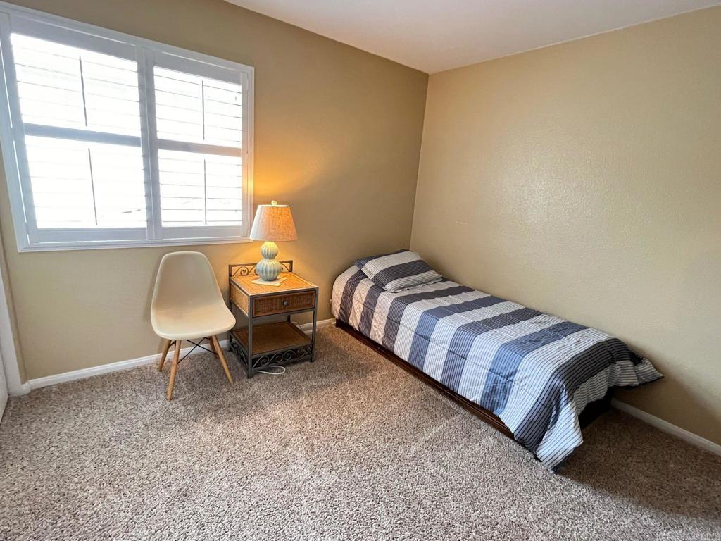 2436 Crooked Trail Road Chula Vista, CA 91914 - Photo 18 of 47 a bedroom with a bed and a chair
