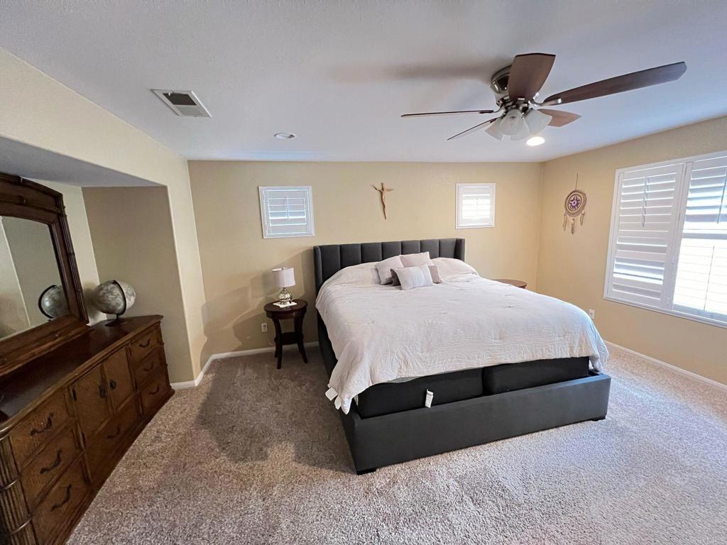 2436 Crooked Trail Road Chula Vista, CA 91914 - Photo 36 of 47 a bedroom with a bed and a dresser