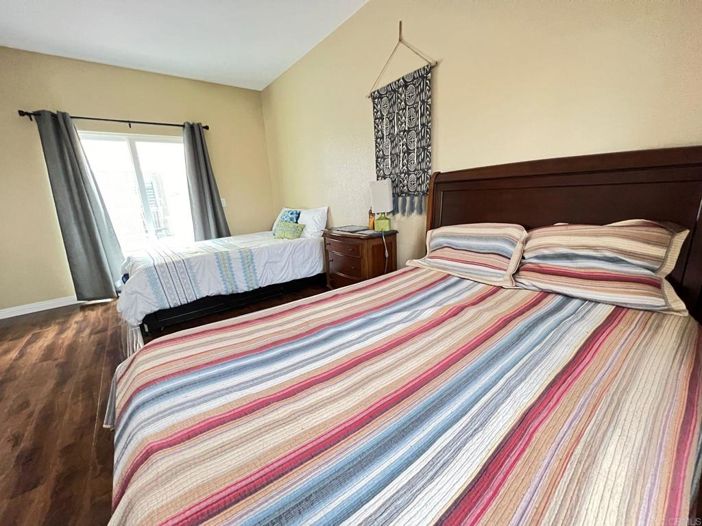 2436 Crooked Trail Road Chula Vista, CA 91914 - Photo 40 of 47 a bedroom with two beds and painting on the wall