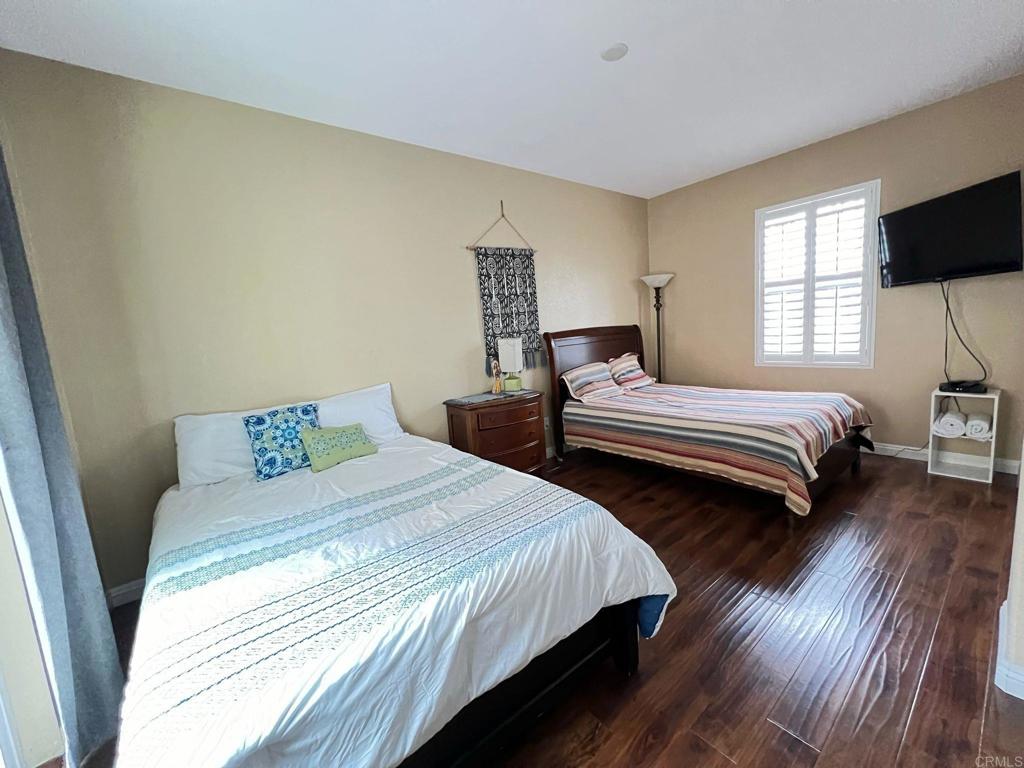 2436 Crooked Trail Road Chula Vista, CA 91914 - Photo 41 of 47 a bedroom with two beds and a flat screen tv