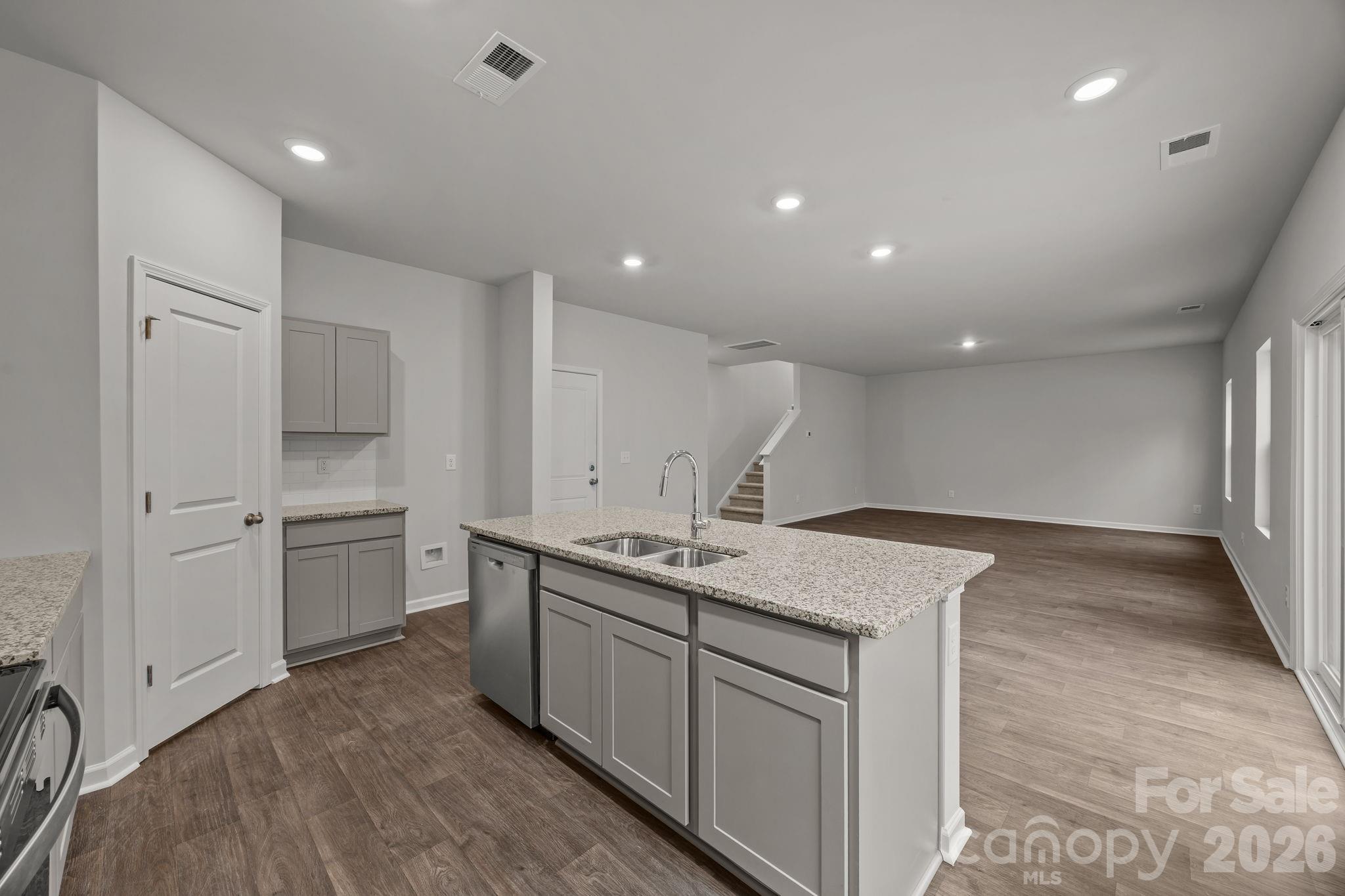 2680 Trawler Way Kannapolis, NC 28083 - Photo 11 of 16 a kitchen with a sink stove and refrigerator
