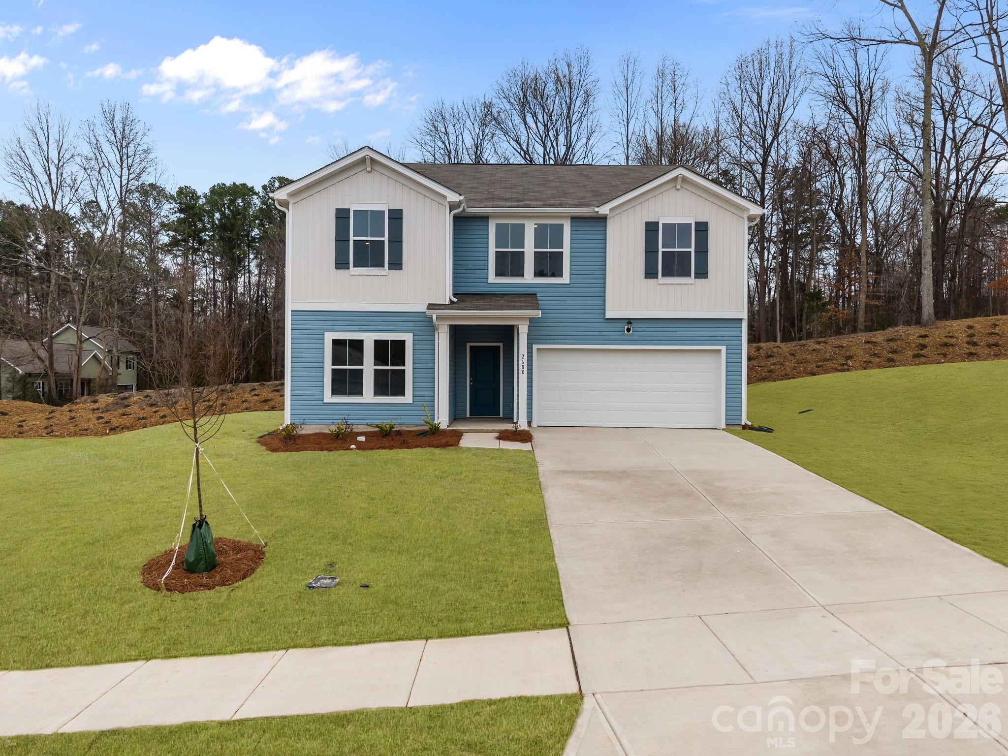 2680 Trawler Way Kannapolis, NC 28083 - Photo 2 of 16 a front view of a house with a yard