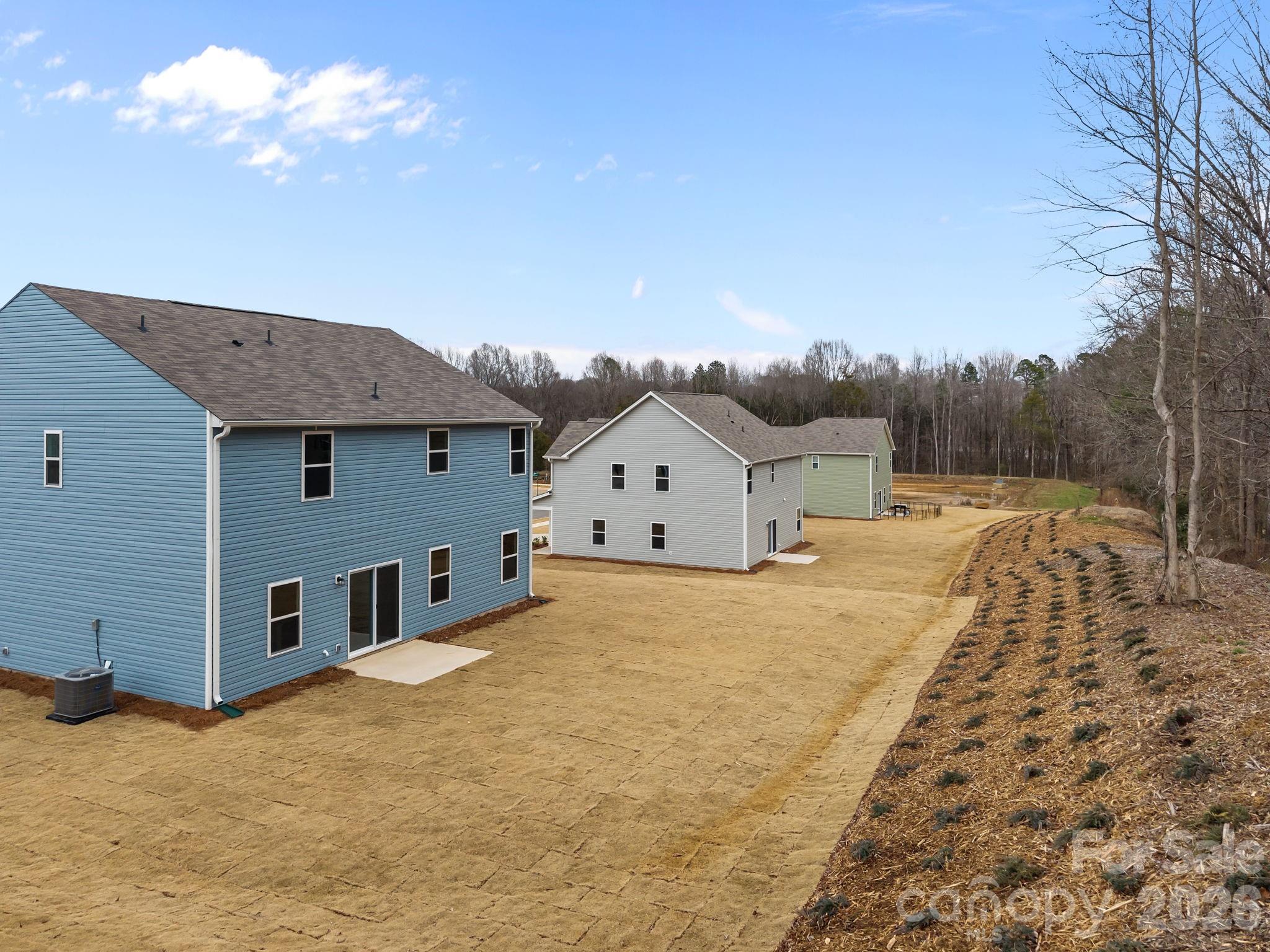 2680 Trawler Way Kannapolis, NC 28083 - Photo 4 of 16 a view of a house with a backyard