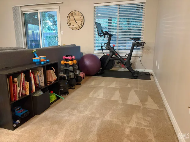 a view of a workspace with furniture