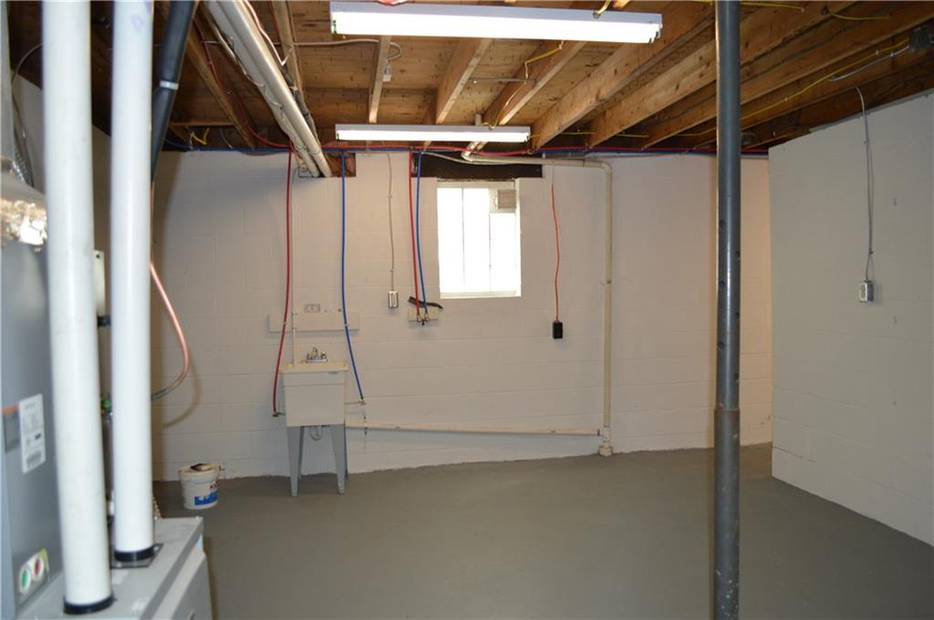 880 Lone Pine Road Amity, PA 15311 - Photo 20 of 25 Clean laundry room with plenty of storage area.