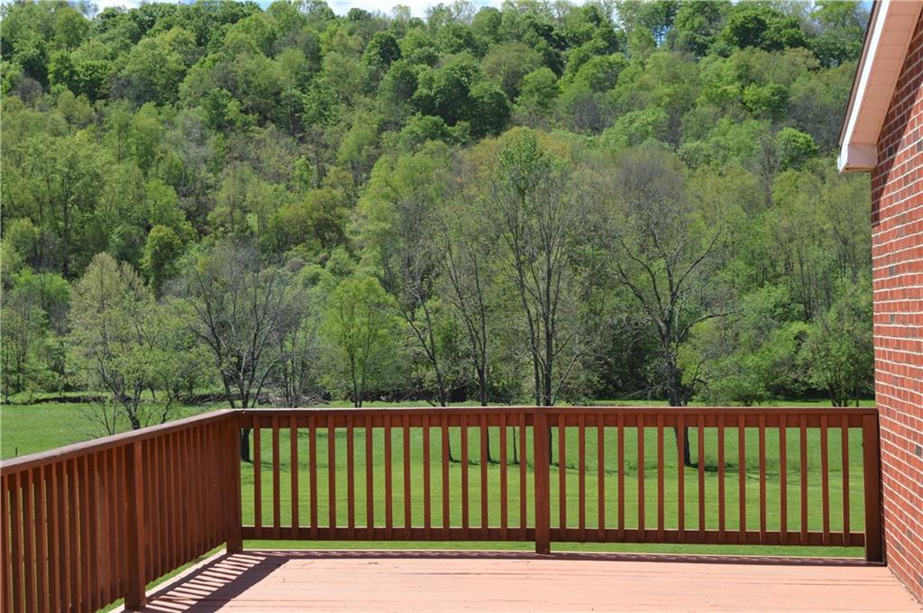880 Lone Pine Road Amity, PA 15311 - Photo 22 of 25 Massive deck to enjoy that beautiful country view.