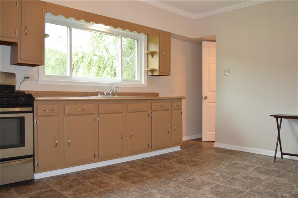 880 Lone Pine Road Amity, PA 15311 - Photo 5 of 25 Large east-in kitchen with a gas stove.
