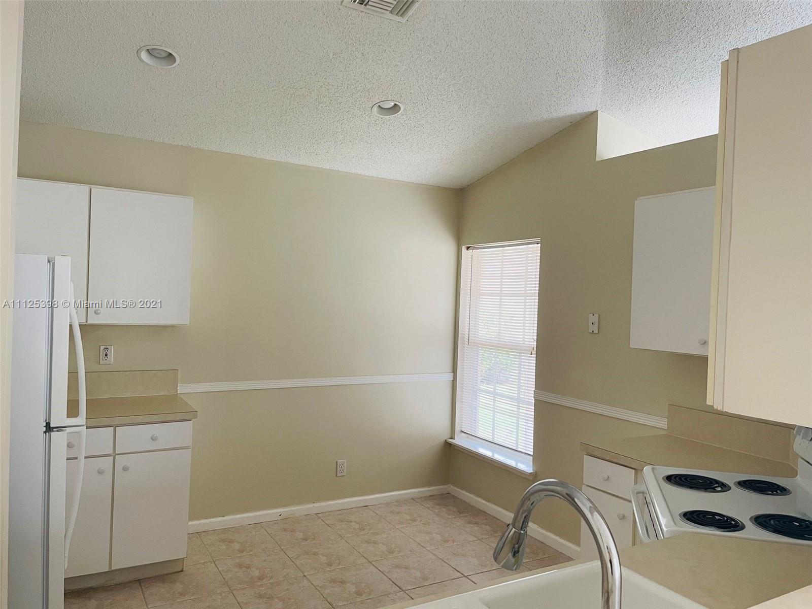 1822 Shadow Creek Road Greenacres, FL 33413 - Photo 5 of 10 Gallery Image 5