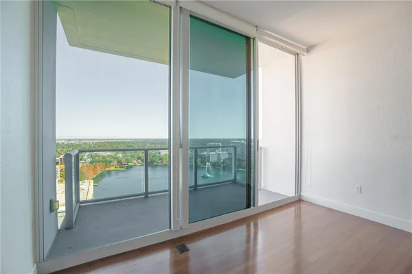a view of a lake with a city from a terrace