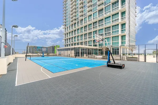 a view of a swimming pool with a lounge chair