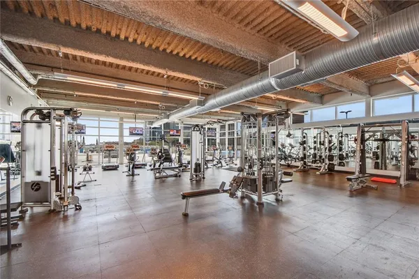 a view of a hall with a flat screen tv